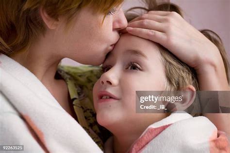 9,387 Mother And Son Kiss Stock Photos & High